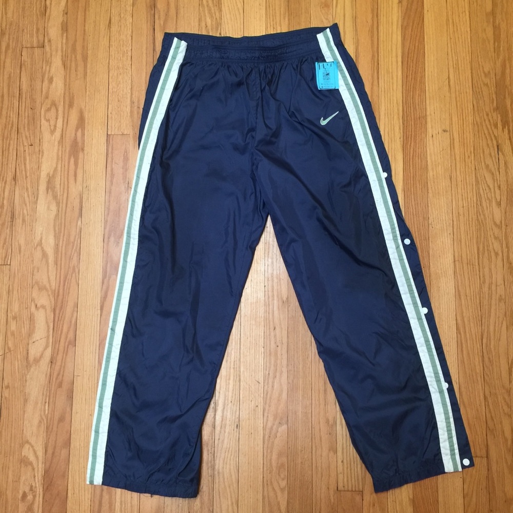 Nike nylon snap away jogger sweatpants.